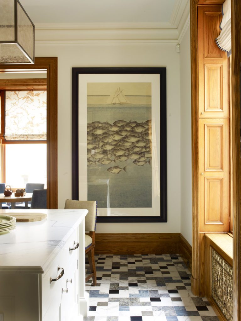 A kitchen with a black and white checkered floor.